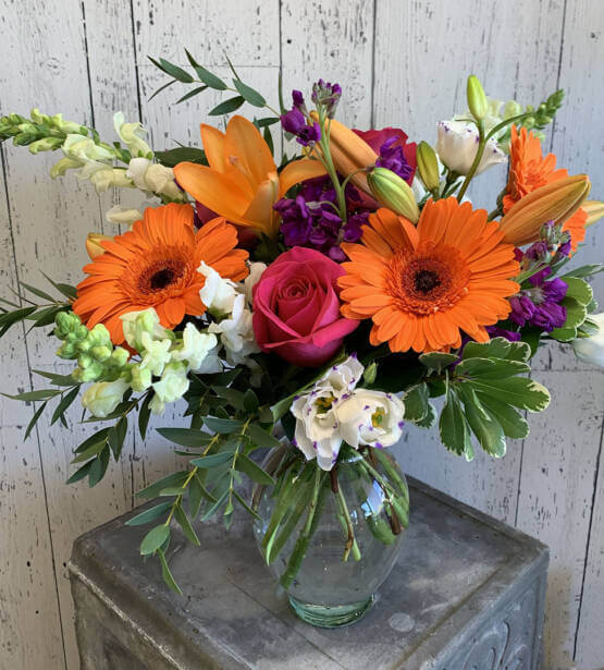 a picture of an orange flower arrangement